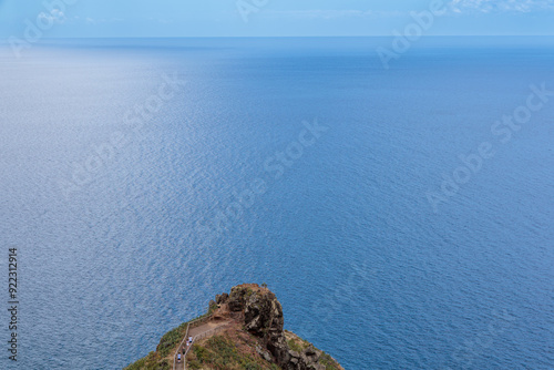 Obraz na płótnie Cristo Rei. Jesus monument on top of a cliff overlooking the Atlantic Ocean and a cable car leading down to the beach on the island of Madeira w salonie