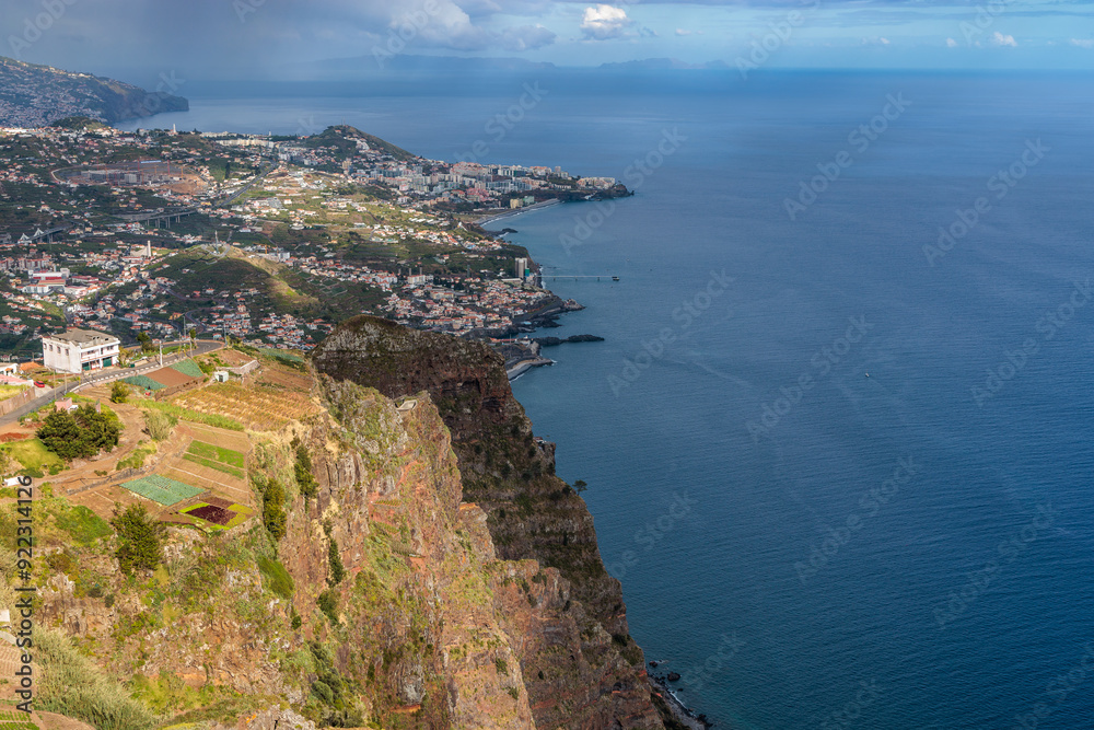 View of the ocean and coastline from the glass-floored Cabo Girao lookout on Madeira Island
