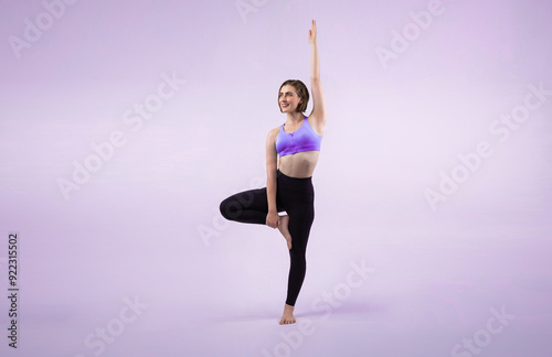 Full body length gaiety shot athletic and sporty woman doing healthy and meditative yoga exercise workout posture on isolated background. Healthy active and body care lifestyle