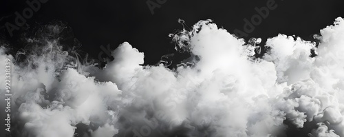 White Smoke or Ink Swirls on a Black Background