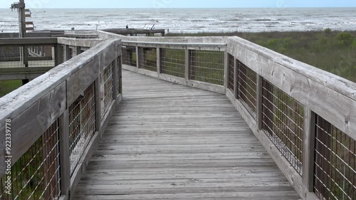 The pier on the Shore at the Sea Rim State Park, Port Arthur Texas photo