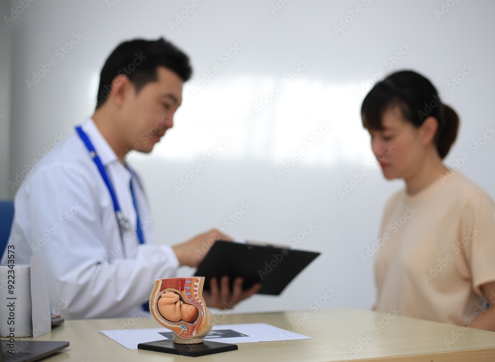 Male doctor with experience examining young pregnant women Male doctor with experience examining young pregnant women
