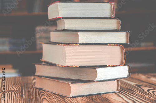 Old books are stacked in the library. Books