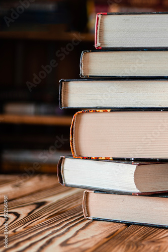 Old books are stacked in the library. Books