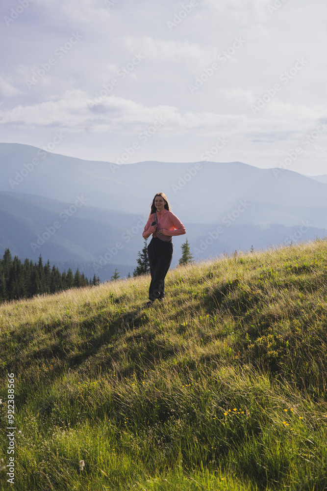 young woman on the background of silhouettes of mountains, travel, hiking, impressions, happiness, rest, smile, young woman on the background of silhouettes of mountains, travel, hiking, impressions, happiness, rest, smile,