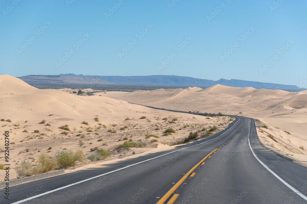 Highway winds through sand dunes Highway winds through sand dunes