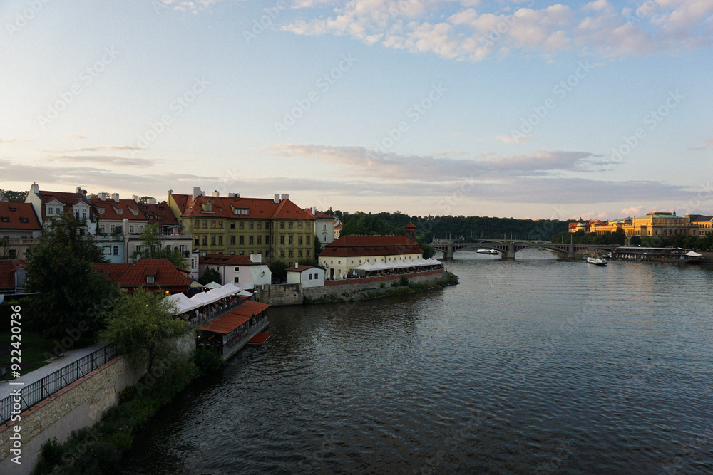 A river through the city at evening A river through the city at evening