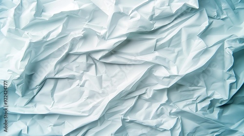  A close-up image of white paper on top of a sheet