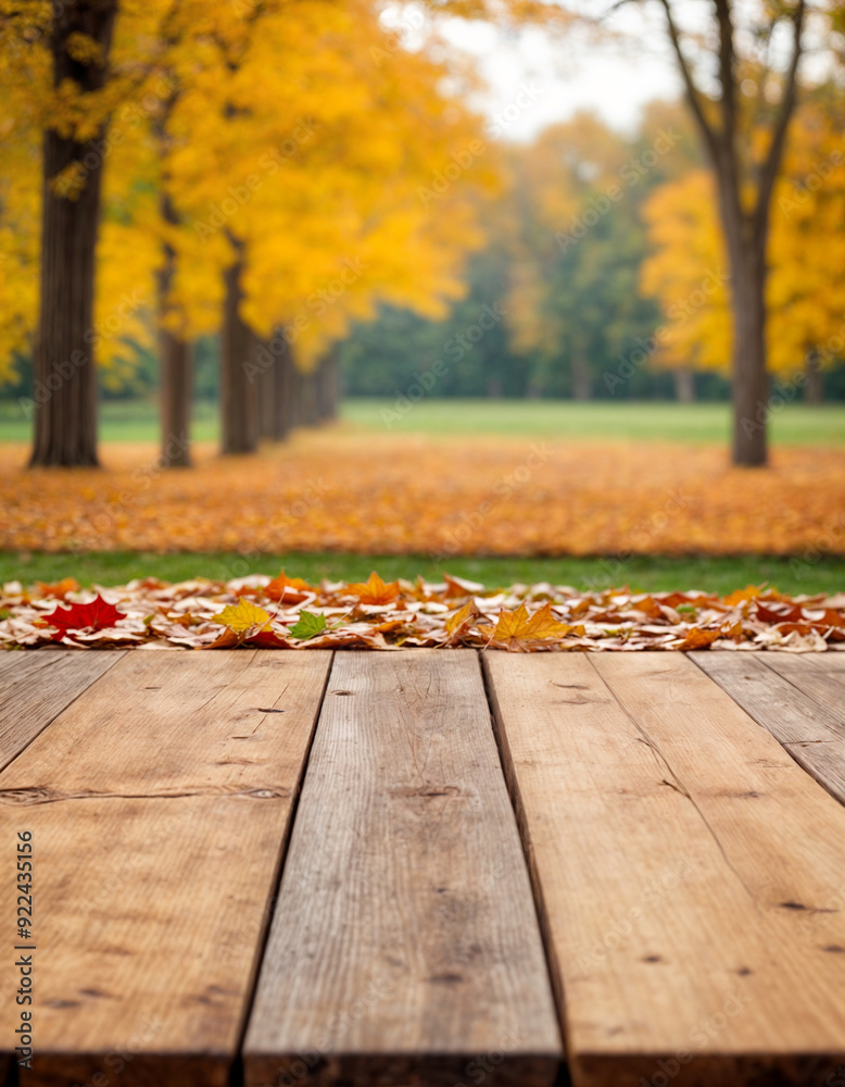The empty wooden table top with blur background of autumn Maple leaves. Exuberant image The empty wooden table top with blur background of autumn Maple leaves. Exuberant image