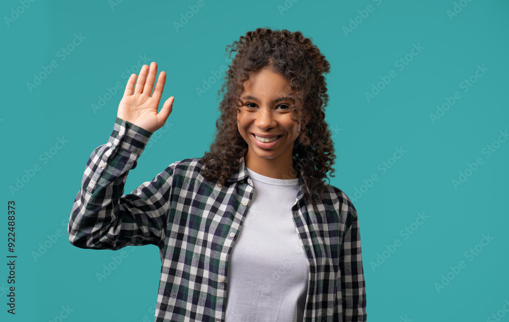 Friendly african eoman waving hand - Hello, Hi, Salute. Greetings on blue Friendly african eoman waving hand - Hello, Hi, Salute. Greetings on blue
