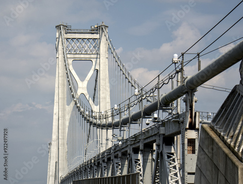 view of the mid hudson bridge to poughkeepsie, new york from highland (suspension bridge over river crossing) scenic landmark (pedestian and bike path, car lanes highway) valley ny state detail photo