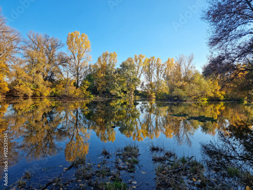 Beautiful Autumn View with reflection at Tundja River, near Ustrem Village, Bulgaria photo