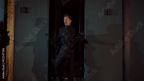 The thief is caught by the police with flashing lights.