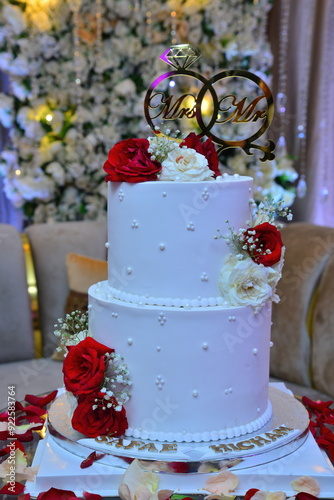 Beautiful and tasty wedding cake at wedding reception photo