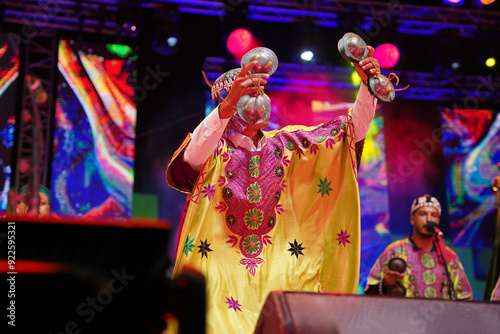 Moroccan musician playing a traditional Moroccan instrument (Qaraqab) Morocco Essaouira on 15-05-2023 photo
