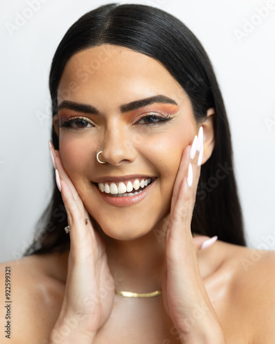 Beauty eye makeup on Brazilian model with smooth skin on white background