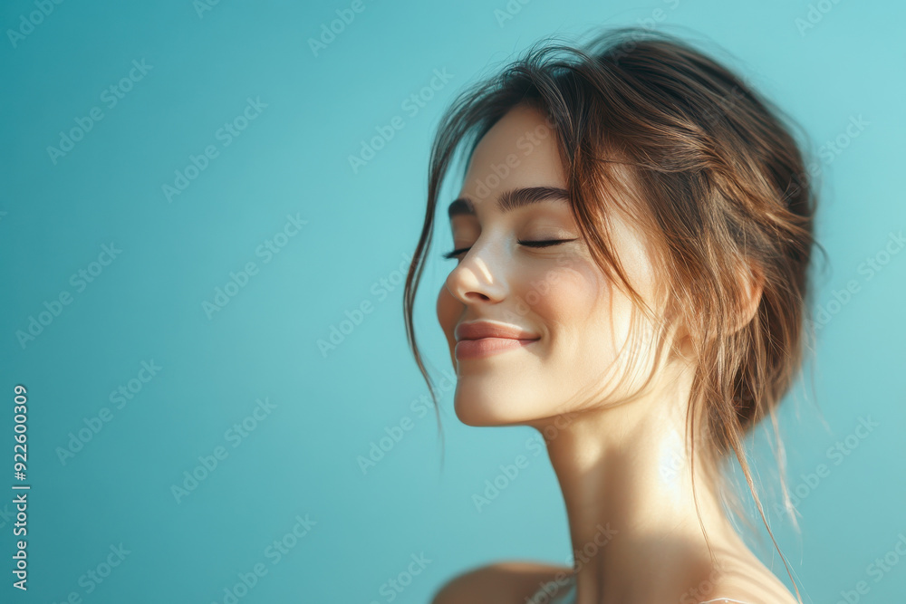 A close up of a woman's face with her eyes closed A close up of a woman's face with her eyes closed