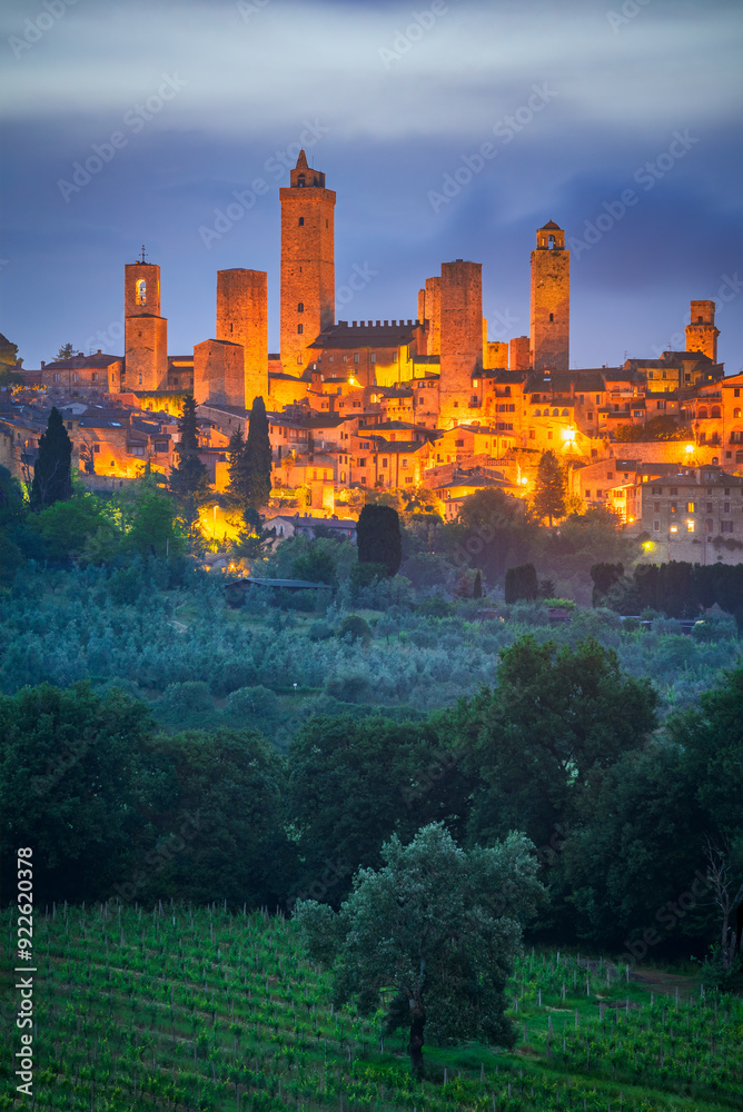 San Gimignano, Italy. Blue hour picturesque view of medieval towers, Tuscany.