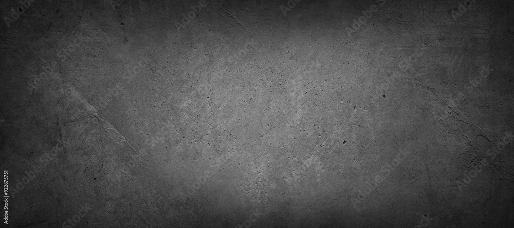 Grey textured concrete wall background. Dark edges Grey textured concrete wall background. Dark edges