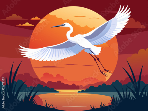 rande aigrette volant au coucher du soleil