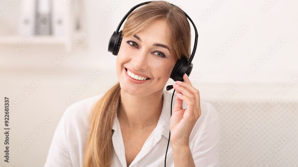 Customer Support. Portrait Of Hotline Operator Lady In Headset Smiling At Camera Working In Call Center Office. Customer Support. Portrait Of Hotline Operator Lady In Headset Smiling At Camera Working In Call Center Office.