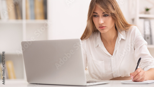 Office Work. Business Girl Sitting At Laptop Taking Notes Studying Or Making Her Schedule At Workplace. Free Download Office Work. Business Girl Sitting At Laptop Taking Notes Studying Or Making Her Schedule At Workplace. - GFXLoad