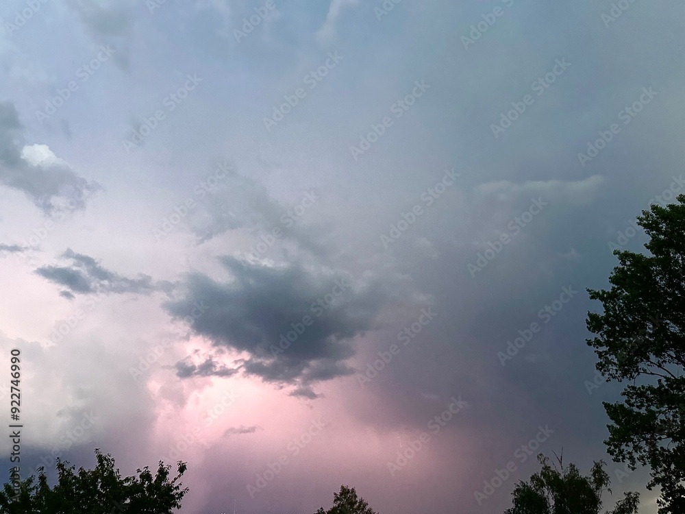 stormy sky, heavy lead clouds in the sun's rays, bad weather, lightning stormy sky, heavy lead clouds in the sun's rays, bad weather, lightning