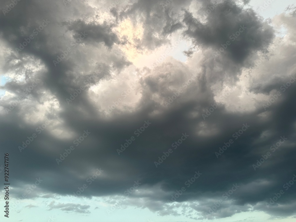 Thunderous dark sky with black clouds and sparkling lightning. Thunderous dark sky with black clouds and sparkling lightning.
