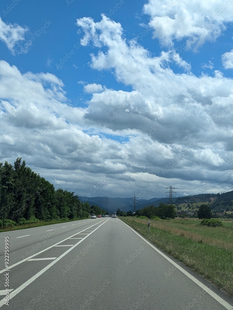 Fototapeta premium Embrace the endless road ahead with boundless freedom and endless possibilities.