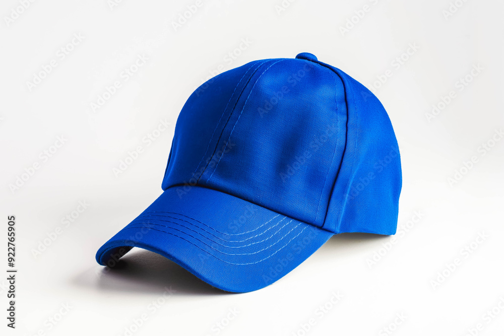 A blue baseball cap on a white background. Perfect for sports-themed designs or promotional materials