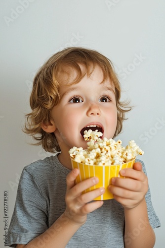 Photorealistic beautiful child eating Delicious popcorn Generative AI photo