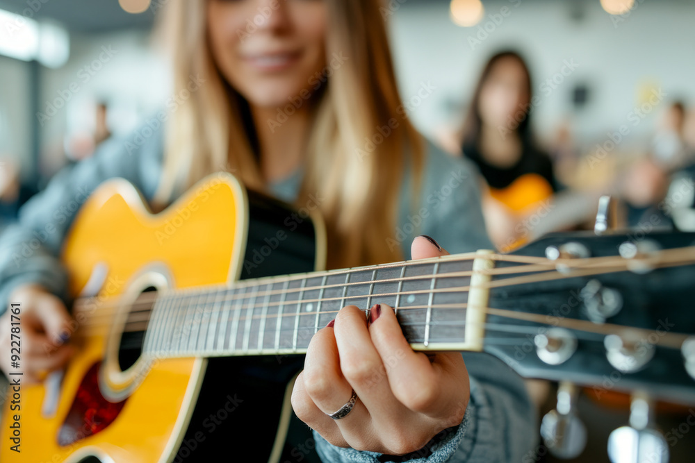 Fototapeta premium Close-up of Woman Playing Acoustic Guitar