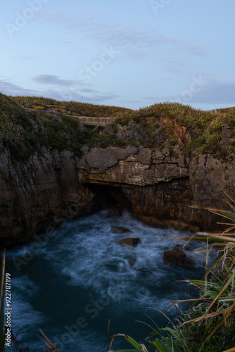 Beautiful view of rock cliff in the ocean.