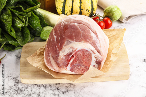 Photography Uncooked raw pork knuckle with spices