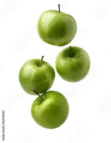 Group of green grenny smith apple falling freely vertically on white background photo