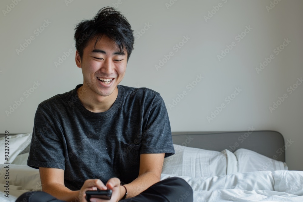 A hotel guest feels happy with his phone result while on vacation.