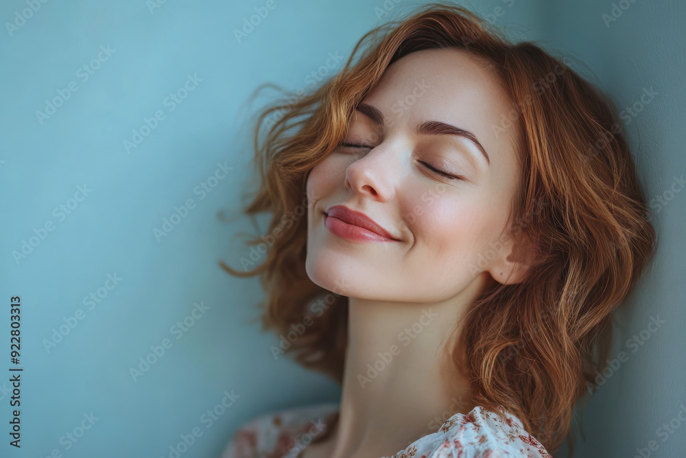 A close up of a woman's face with her eyes closed A close up of a woman's face with her eyes closed
