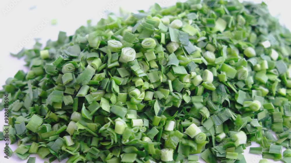 Chopped fresh ripe scallion and garlic on white background. Ingredient salsa Chopped fresh ripe scallion and garlic on white background. Ingredient salsa