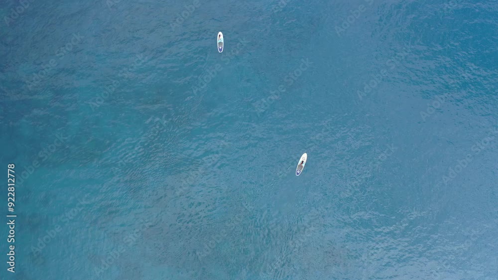 4K Aerial Video of Stand Up Paddle Boarder Girls at Greek Island Coastline. 4K Aerial Video of Stand Up Paddle Boarder Girls at Greek Island Coastline.