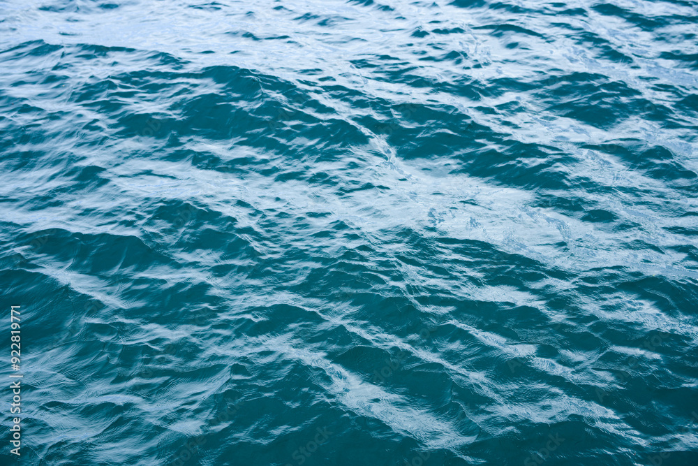 Obraz premium Sea texture. View of ocean waves. Blue water background. Blue ocean water texture background. Surface of the sea.