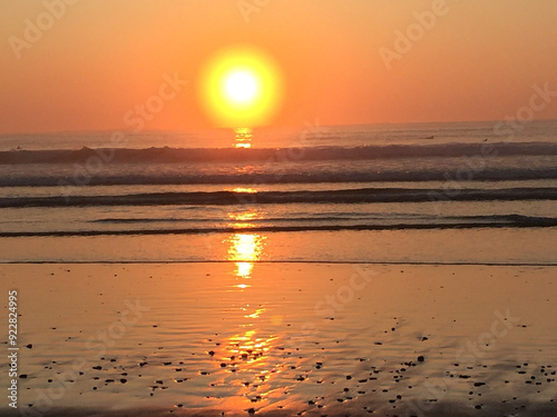 sunset in Rye, South Hampton at the ocean with reflection photo