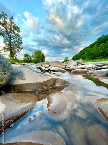 Dramatic close up creek trail tucked away in the Catskill Mountains.  Scenic picturesque landscape with all season stunning views.  The wilderness is perfect to hike, swim, fish, kayak, bike, camp. photo