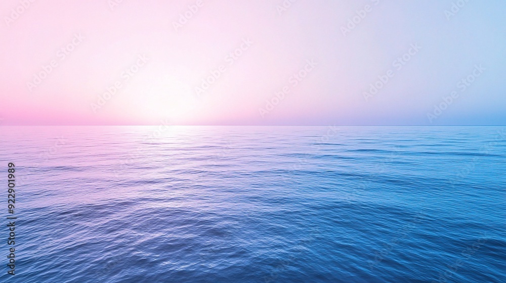 Obraz premium Pastel Paradise Sunset: Serene ocean sunset bathed in tranquil hues of pink and blue, a captivating blend of nature's artistry. 