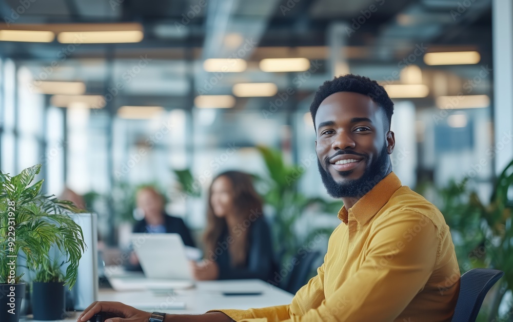 A lawyer with a diverse team of legal professionals , Confident African American Businessman Smiling at Camera in Modern Office A lawyer with a diverse team of legal professionals , Confident African American Businessman Smiling at Camera in Modern Office