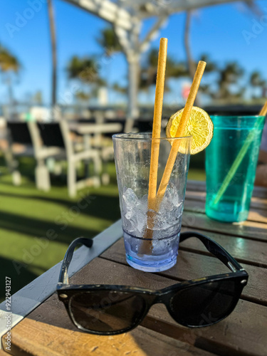 Empty drink glasses sit on patio table at Florida restaurant