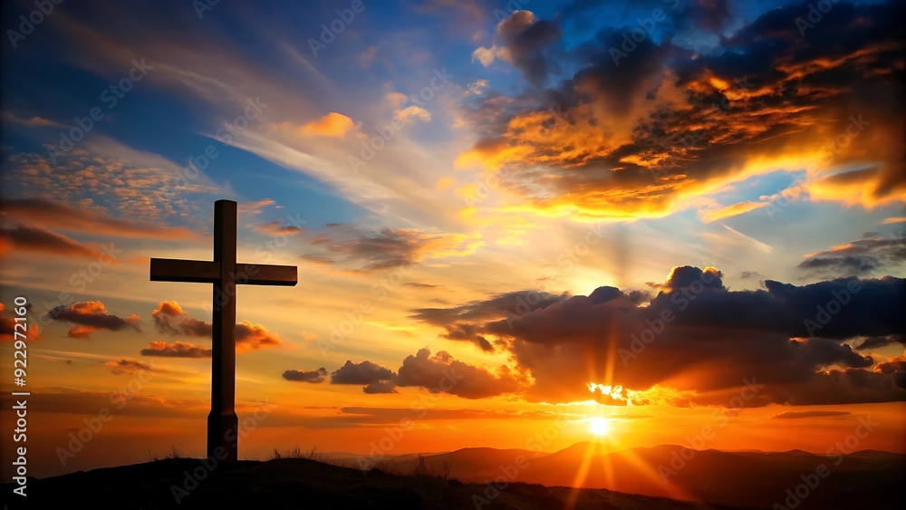 Silhouette of a cross against a vibrant sunset sky. Silhouette of a cross against a vibrant sunset sky.