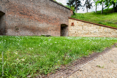 Green  lawn near the wall of the casemates in the Vysehrad district of Prague in Czech Republic photo