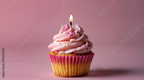 Single Pink Cupcake with Candle and Sprinkles - Realistic Image