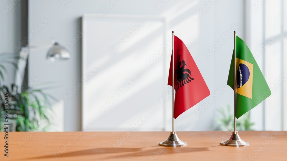 FLAGS OF ALBANIA AND BRAZIL ON TABLE FLAGS OF ALBANIA AND BRAZIL ON TABLE