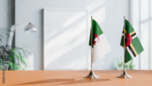 FLAGS OF ALGERIA AND DOMINICA ON TABLE